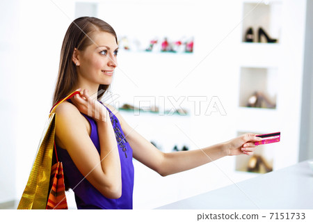 Young woman doing shopping Young woman doing shopping 7151733
