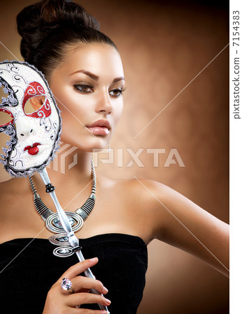 Masquerade. Beauty Girl with Carnival Mask 7154383