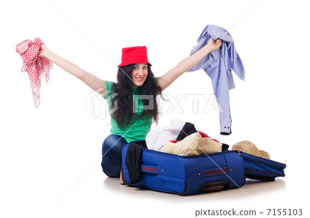 Young girl packing for vacation 7155103