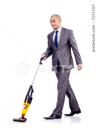 Businessman doing vacuum cleaning on white Businessman doing vacuum cleaning on white 7155167