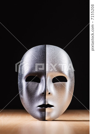 Mask against the dark background Mask against the dark background 7155208