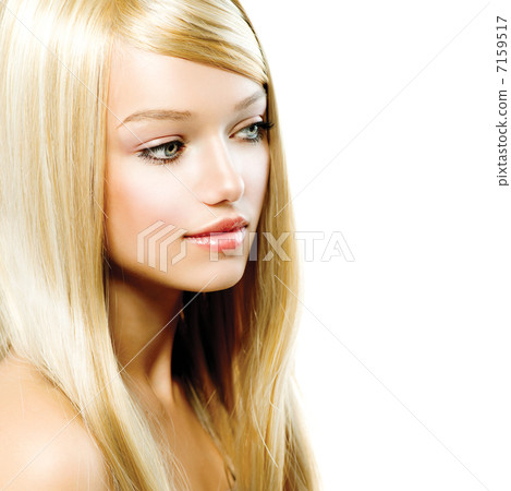 Beautiful Blond Girl isolated on a White Background 7159517