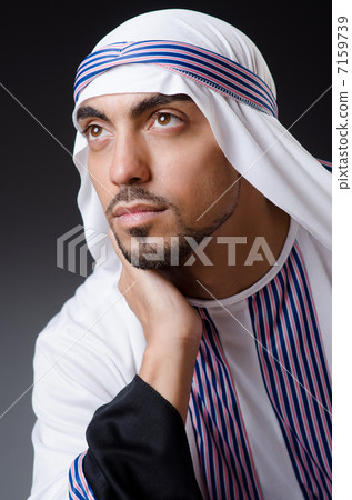 Arab businessman isolated on the white Arab businessman isolated on the white 7159739