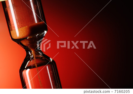 hourglass on red background 7160205