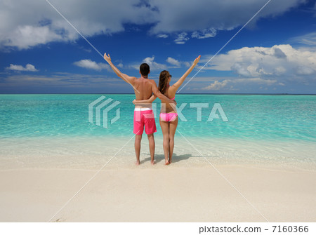 Couple on a beach at Maldives Couple on a beach at Maldives 7160366