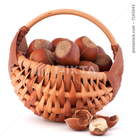 Hazelnuts in wicker basket Hazelnuts in wicker basket 7165043