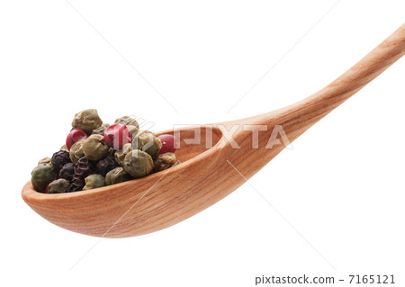 Pepper seasoning mix in wooden spoon isolated on white backgrou Pepper seasoning mix in wooden spoon isolated on white backgrou 7165121