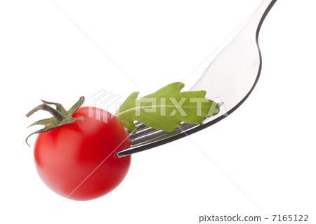 Fresh rucola salad and cherry tomato on fork isolated on white Fresh rucola salad and cherry tomato on fork isolated on white 7165122