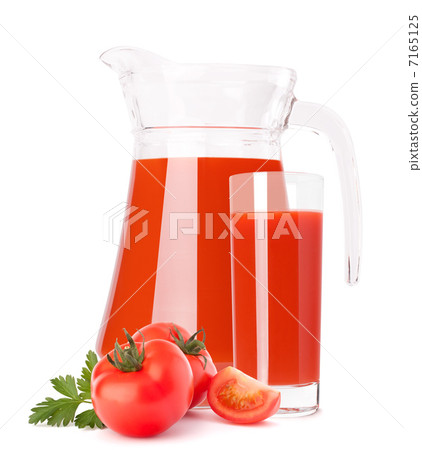 Tomato vegetable juice in glass jug 7165125