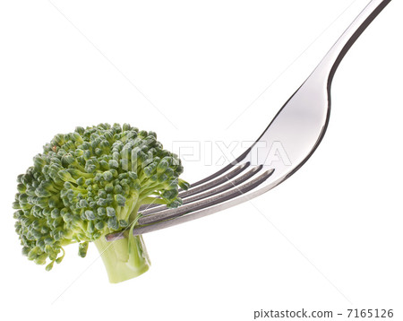 Broccoli on fork isolated on white background cutout. Healthy ea Broccoli on fork isolated on white background cutout. Healthy ea 7165126