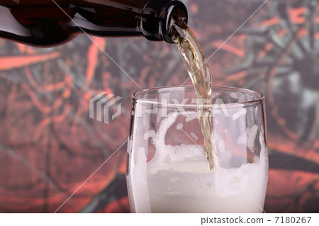 Pouring beer from bottle Pouring beer from bottle 7180267