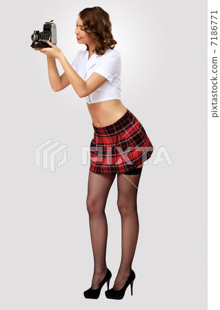 Young pretty woman dressed in retro style 7186771
