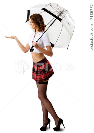 Woman dressed in retro style with umbrella 7186772