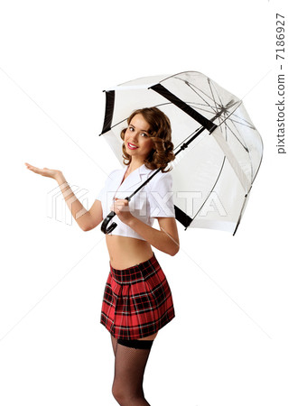 Woman dressed in retro style with umbrella 7186927