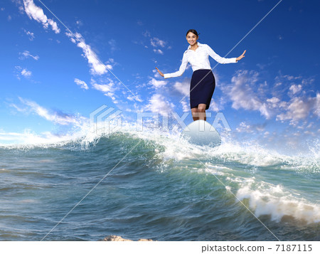 Businesswoman surfing on the sea waves 7187115