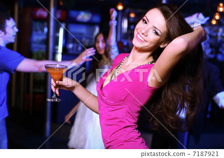 Young woman having fun at nightclub disco Young woman having fun at nightclub disco 7187921