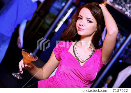 Young woman having fun at nightclub disco Young woman having fun at nightclub disco 7187922