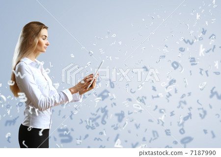 Woman in business wear with technology background Woman in business wear with technology background 7187990