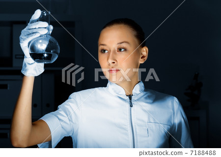 Young chemist working in laboratory Young chemist working in laboratory 7188488