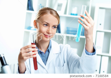 Young scientist working in laboratory Young scientist working in laboratory 7188584