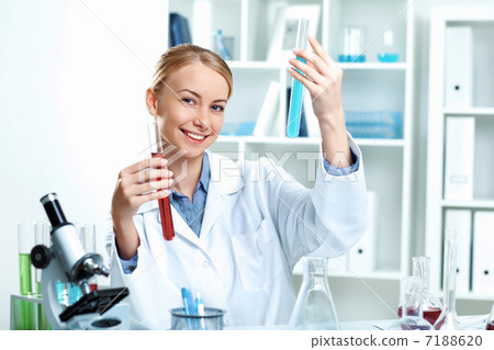 Young scientist working in laboratory Young scientist working in laboratory 7188620