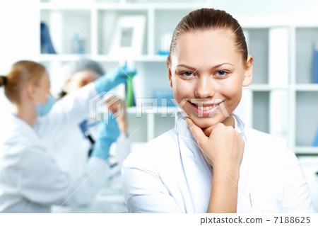 Young scientists working in laboratory 7188625