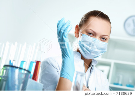 Young scientist working in laboratory Young scientist working in laboratory 7188629