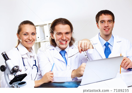 Young doctors at work Young doctors at work 7189235