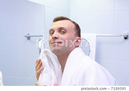 young man in bathroom young man in bathroom 7189395