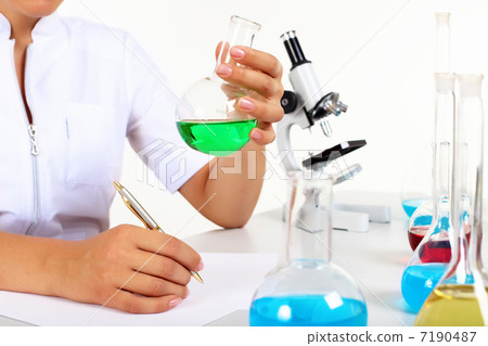 Female scientist in a chemistry laboratory 7190487