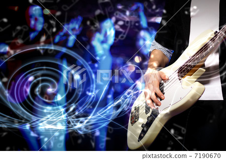 Young guitar player performing in night club 7190670