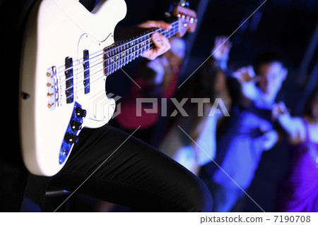 Young guitar player performing in night club Young guitar player performing in night club 7190708