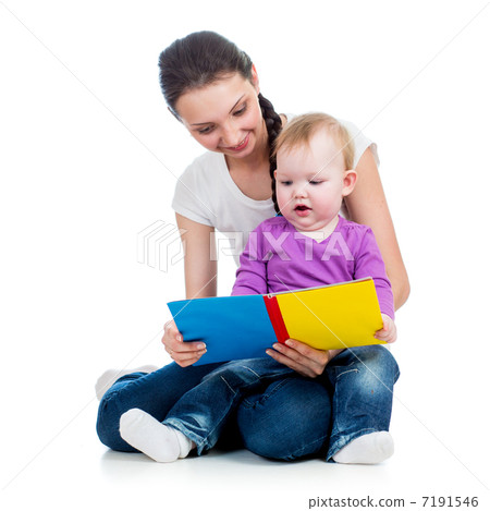 happy mother reading a book to child girl happy mother reading a book to child girl 7191546