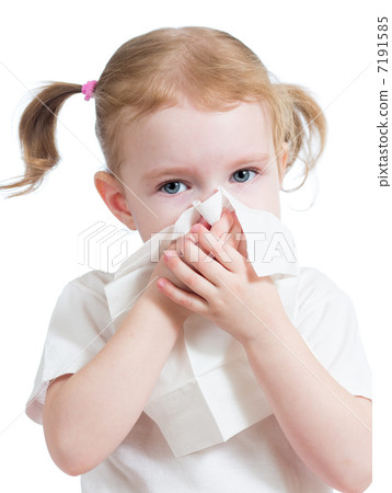 kid cleaning nose with tissue isolated on white kid cleaning nose with tissue isolated on white 7191585