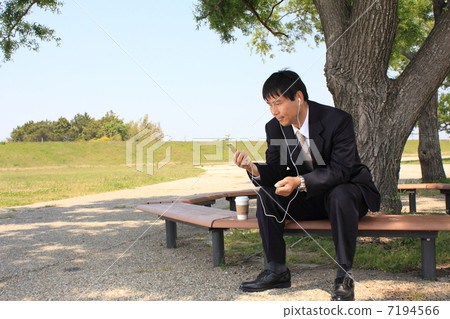 Shady man and smartphone Shady man and smartphone 7194566