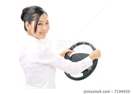 A woman holding a car handle 7194939