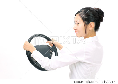 A woman holding a car handle 7194947