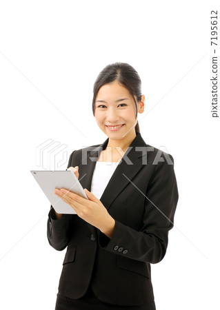 Business woman using tablet 7195612