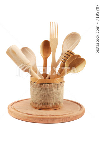 Wooden kitchen utensils isolated on white background. 7195707
