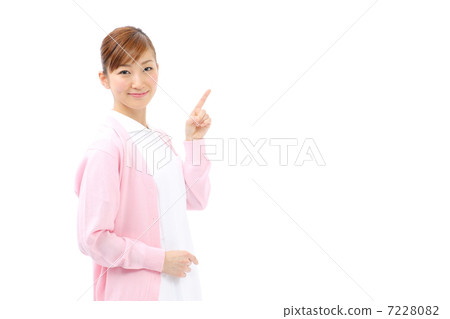 Pointing nurse / dental hygienist 7228082