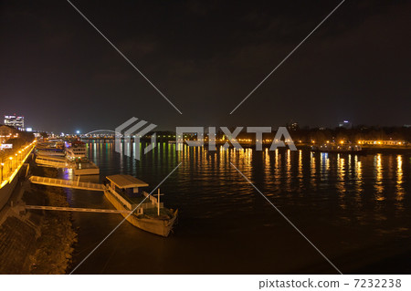 Barge and night lights on the Dunai river Barge and night lights on the Dunai river 7232238