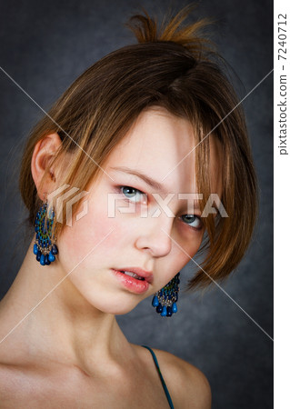 girl with blue earrings girl with blue earrings 7240712
