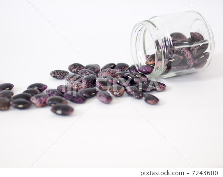 Flower beans spilled from the bottle 7243600