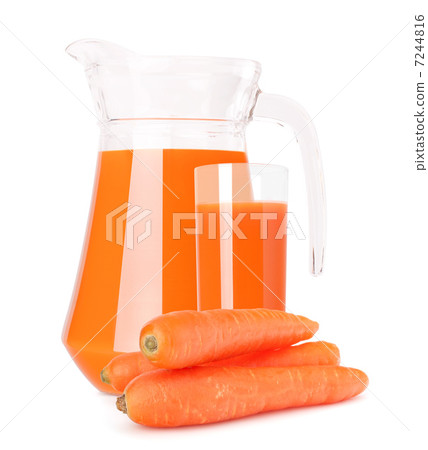 Carrot vegetable juice in glass jug 7244816