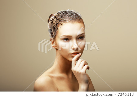 Fantasy. Creative Concept. Tarantula Spider on Woman's Head sitting in Metallic Cobweb Fantasy. Creative Concept. Tarantula Spider on Woman's Head sitting in Metallic Cobweb 7245113