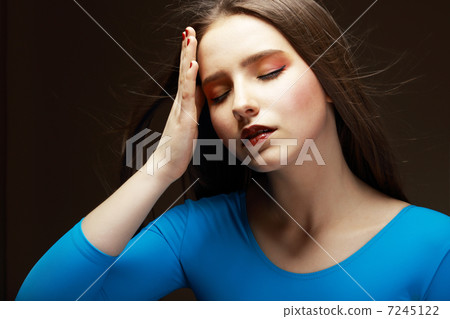 Distress. Woe. Upset Tired Woman Touching her Forehead. Difficulties 7245122