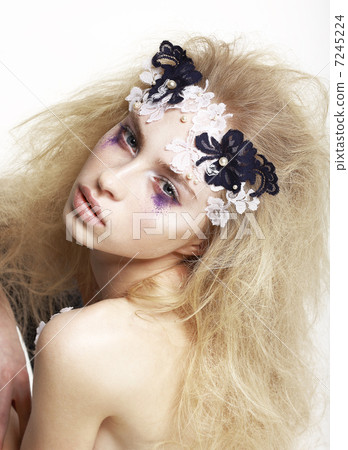 Girl with Bright Futuristic Mask and Make-up. Creative Faceart Girl with Bright Futuristic Mask and Make-up. Creative Faceart 7245224