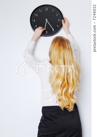 Office Girl Sets the Clock Office Girl Sets the Clock 7248932