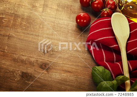 Wooden spoon and ingredients on table Wooden spoon and ingredients on table 7248985
