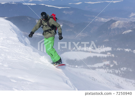 Backcountry Freerider on the Brink of a Precipice 7250940
